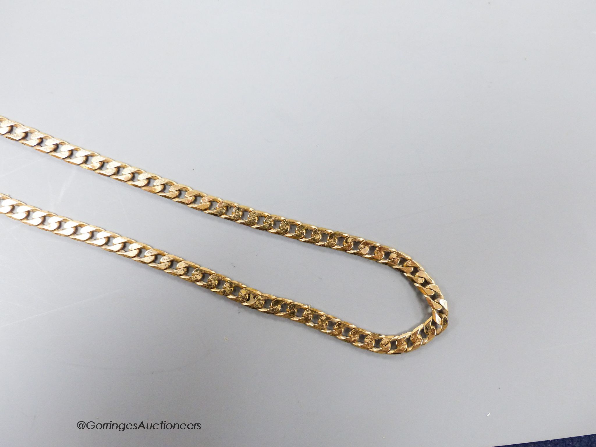 A 9ct gold flattened curb-link necklace, 47cm, 14.3 grams.